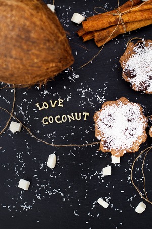 coconut muffins on a black background inscription love coconuts, close-upの写真素材