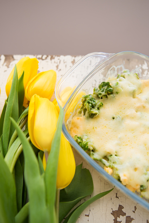 bright casserole with broccoli, cheese and cream, close-upの写真素材
