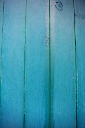 Shabby and very old green-blue wooden fence.の写真素材