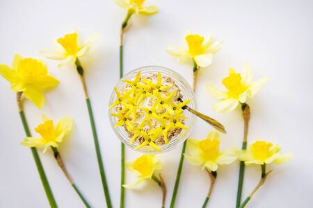 A big bouquet of daffodils and beautiful yellow flowers on the table.の写真素材