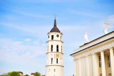 View of the bell tower and the cathedral of the Basilica of St. Stanislaus and St. Vladislav. Vilnius, Lithuania.の写真素材