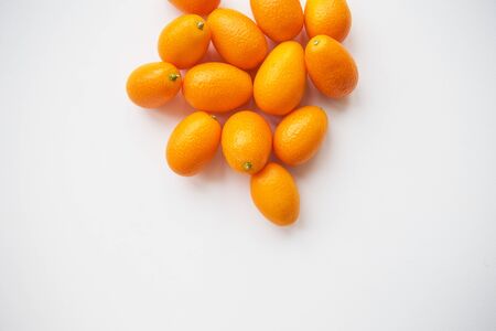 delicious kumquat isolated on white background, close-up.の写真素材