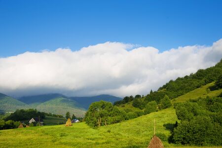 beautiful Carpathian landscapes little village in summerの写真素材