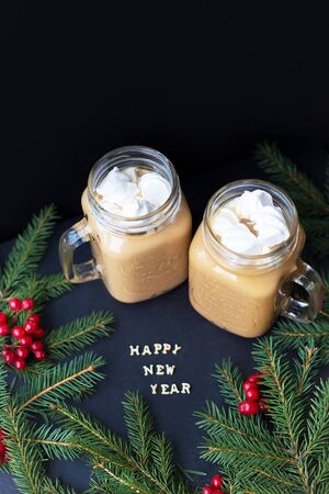 Christmas holiday background with hot cocoa marshmellou. The inscription Happy New Year.の写真素材