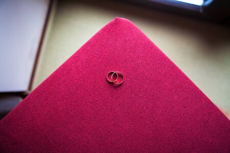 wedding rings lie on the couch, preparing for the wedding, wedding decorationsの写真素材