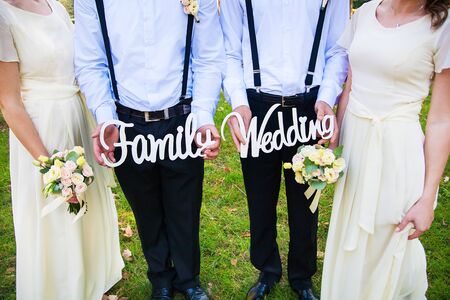 funny and beautiful witnesses to keep the wooden family letters and weddingの写真素材