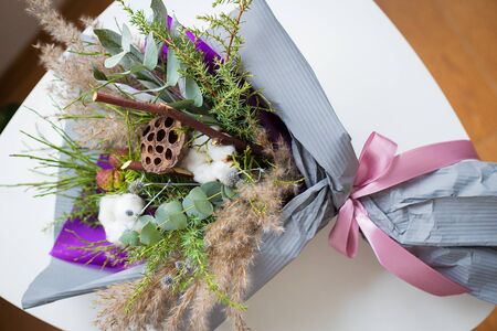 Winter beautiful bouquet of cotton. Christmas beauty wedding bouquetの写真素材