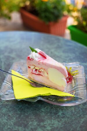Very tasty frozen piece of ice cream cake with strawberriesの写真素材