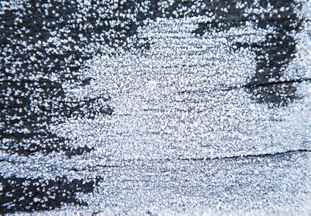Background of wooden boards covered snow.の写真素材