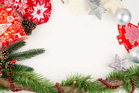 Wooden ornament with Christmas tree cones, Christmas gift, sock for Santa isolated on white background. Christmas concept, 2021の写真素材