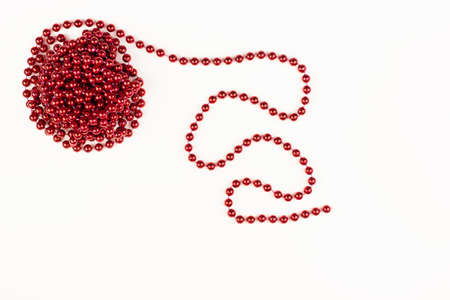 Christmas red decoration on a Christmas tree isolated on a white backgroundの写真素材