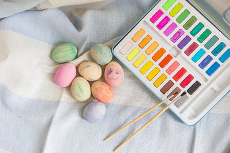 Easter, festive mood. Painted multi-colored Easter eggs which are painted with watercolor paint, hand-paintedの写真素材