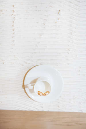 wedding rings in a circle, which is hanging on the wall.の写真素材