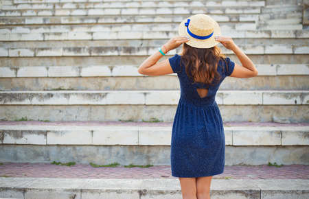 The girl stands with her back in the amphitheater. Bulgaria, Nessebar.の写真素材