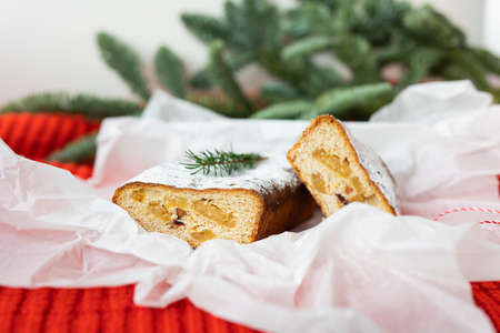 Very tasty and fragrant adit with citrus fruits, marzipan, cinnamon lies on white craft paper. New Year's and Christmasの写真素材