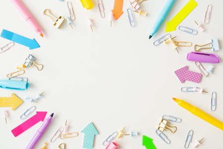 Stationery, school supplies on a white table in bright pastel colors. Office set, place for an inscriptionの写真素材