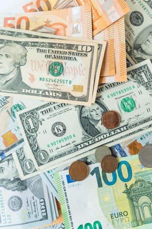 Multicurrency banknotes, coins. The concept of the world economy during the crisis. Money rules in...