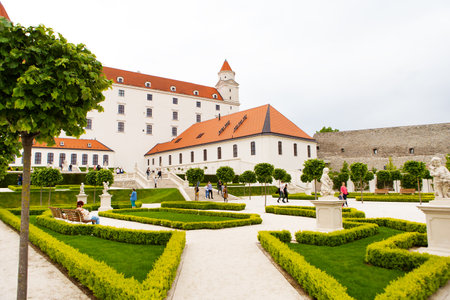 The courtyard garden of the baroque castle of Bratislava. The castle stands on an isolated rocky hill directly above the Danube River in the center of Bratislava, Slovakiaの写真素材