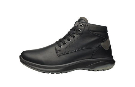 Men leather waterproof winter trekking shoe isolated on white background. New sports hiking boot with shoelaces - side view. Unisex shoes for cold weather. Full depth of field. high quality photoの写真素材
