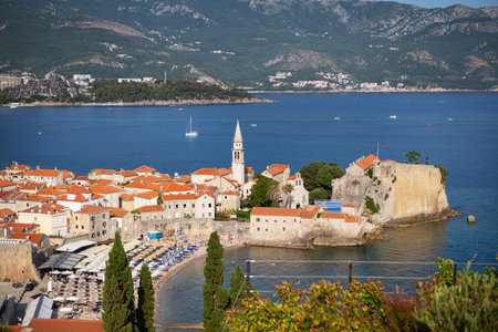 Montenegro - Budva: July 4, 2021.: Aerial view of the old town of Budva, the Adriatic sea and mountainsの写真素材