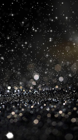 A mesmerizing black and white glittery surface with sparkling stars, creating a magical, celestial atmosphereの素材