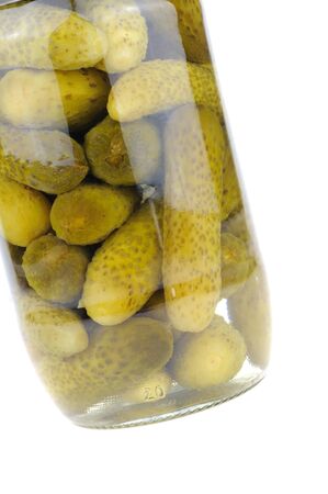 Pickled gherkins in a jar, white backgroundの写真素材