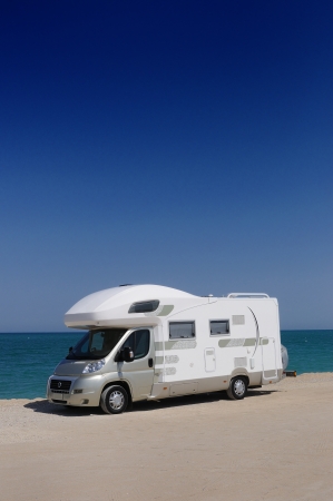 Camper van on the beachの写真素材