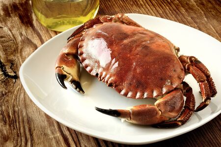 Boiled crab on a old wooden tableの写真素材