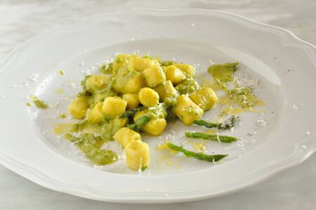 Gnocchi with asparagus, fresh italian pasta, closeupの写真素材