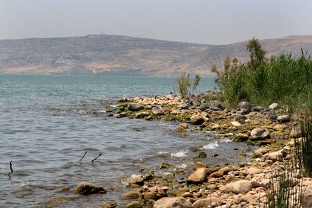 Rocks by the shore of the Sea of Galilee, Israel.の写真素材