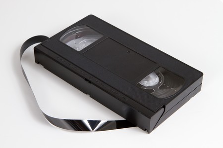 Obsolescent video tape cassette with tape.