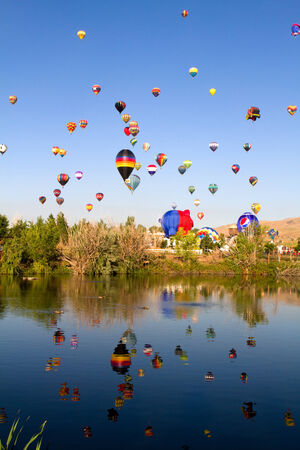 RENO, NEVADA, USA - SEPTEMBER 6, 2013: The Great Reno Balloon Race on September 6, 2013 in Reno, Nevada, USA. The early morning mass ascension of dozens of hot-air balloons draws thousands of tourists to the area as the sky fills with balloons in what is のeditorial素材