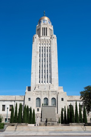 The tower of the Nebraska State Capitol building is 15 stories tall and is capped with a gold tiled dome. It is located in Lincoln, Nebraska, USA.のeditorial素材