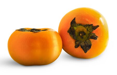 Pair of ripe persimmon fruits isolated on white background. Two whole persimmonsの写真素材
