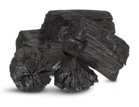 Natural wood charcoal, traditional charcoal or hard wood charcoal isolated on white backgroundの写真素材