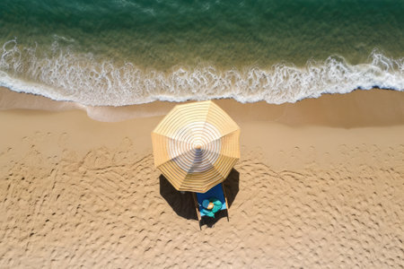 Holiday time on the beach sun hat and chair on the sand Generative AI Illustration.の素材