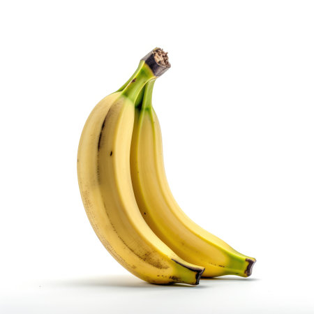 Fresh ripe yellow bananas for fruit salad on a white background Generative AI Illustration.の素材