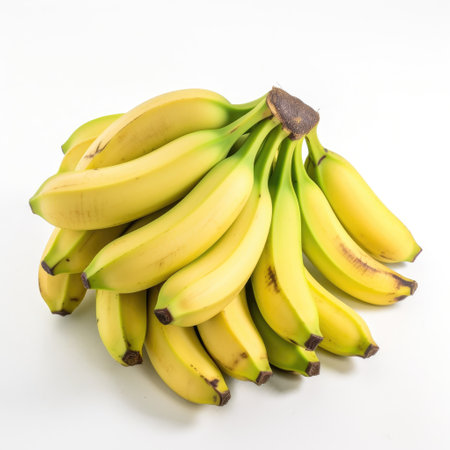 Pile of fresh raw ripe bananas for fruit salads recipes with white background Generative AI Illustration.の素材
