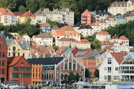 View of Bergen city centre, with homes and buildings flanking the hillside.のeditorial素材