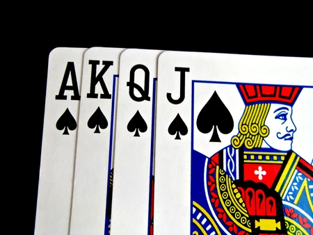 spade four cards isolated on black background