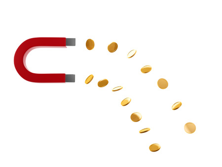 magnet and gold coin isolated on white backgroundの写真素材