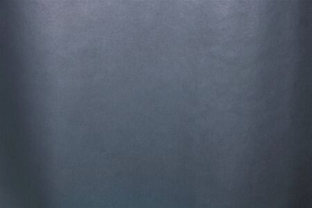 Medium blue soft texture background framed with dark blue edges with copy space.の写真素材