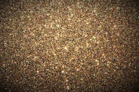 Sparkling gold glitter full frame abstract background.の写真素材
