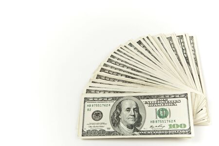 fanned stack of money centered hundred dollar bills の写真素材