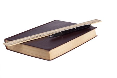 leather book pen and ruler の写真素材