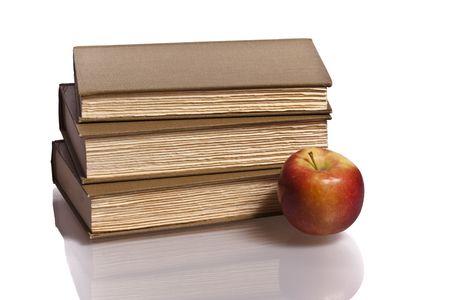 reflection three books apple の写真素材