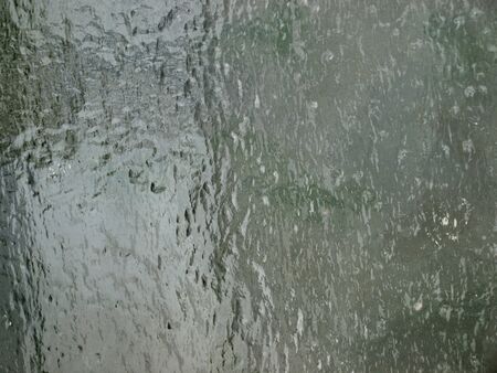 Ice on the old window glassの写真素材