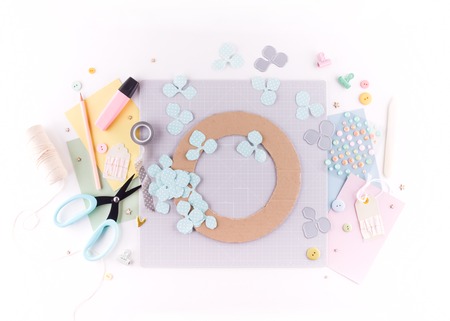 Scrapbooking master class. Diy. Make a spring decor for interior - floral wreath made of paper. Pastel colors. Women's hobby. Step by stepの写真素材