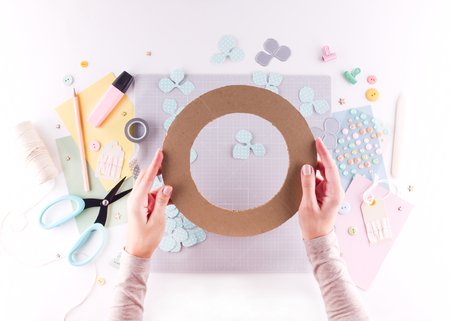 Scrapbooking master class. Diy. Make a spring decor for interior - floral wreath made of paper. Pastel colors. Women's hobby. Step by stepの写真素材