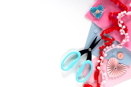 Valentines day and 14 february holidays banner. Gift wrapping workspace. Decoration presents making flat lay top view celebration preparation DIY concept decor on white backgroundの写真素材